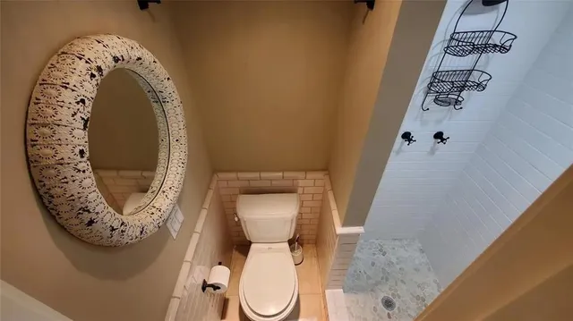 a close view of a utility room with dryer and washer