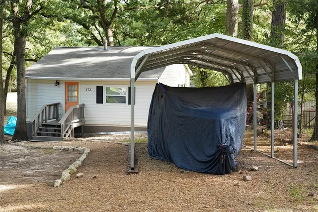 a view of outdoor space yard and garage