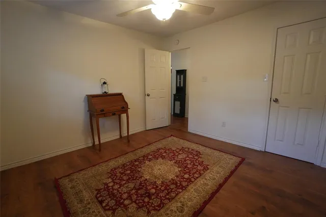 a view of a hallway with closet