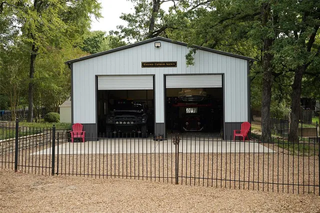 a front view of a house with garage
