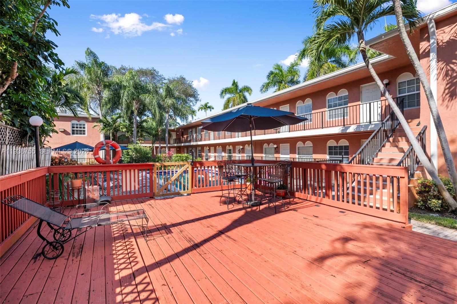 1405 Miami Road, Unit 10 Fort Lauderdale, FL 33316 - Photo 5 of 14 a view of a chairs on deck