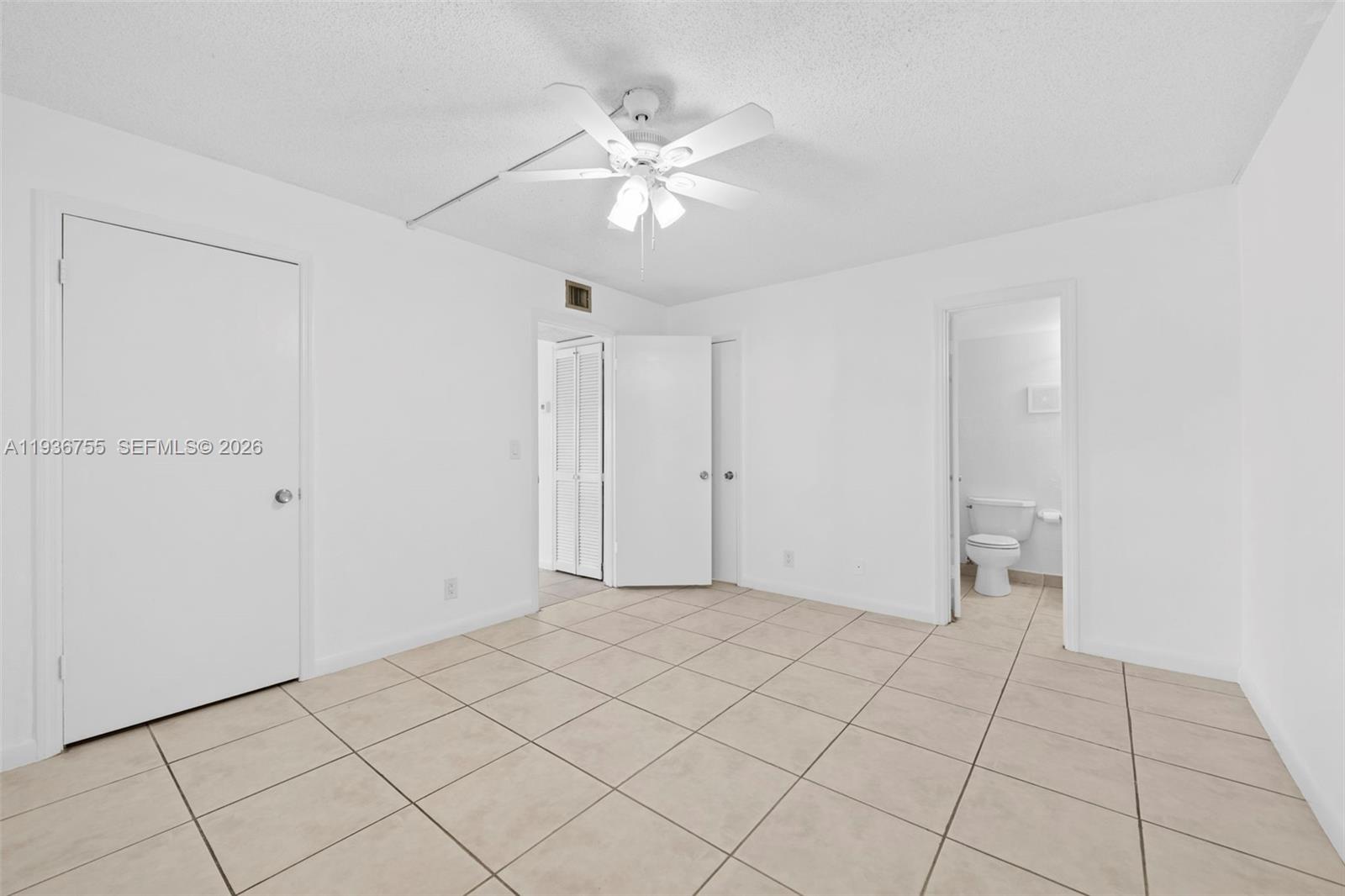 1405 Miami Road, Unit 10 Fort Lauderdale, FL 33316 - Photo 6 of 14 a view of an empty room