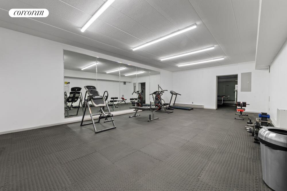 23-22 30th Road, Unit 8G Queens, NY 11102 - Photo 9 of 11 a view of a room with gym equipment