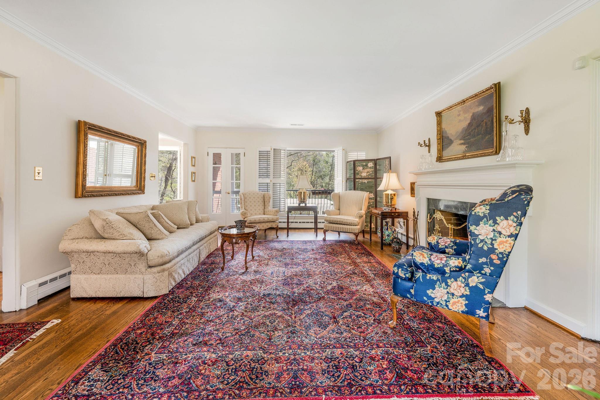 4 Dogwood Road Asheville, NC 28804 - Photo 11 of 48 a living room with furniture rug and window