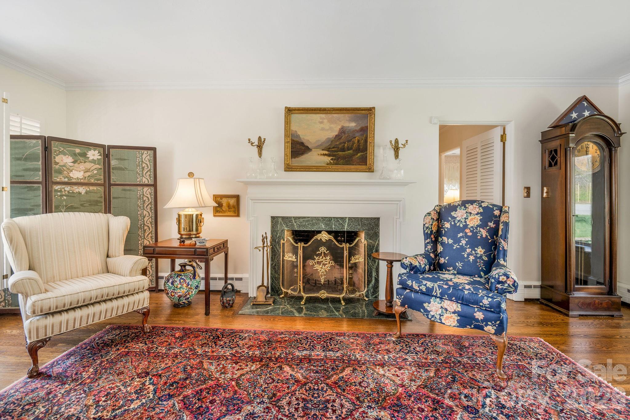 4 Dogwood Road Asheville, NC 28804 - Photo 12 of 48 a living room with furniture a fireplace and a rug