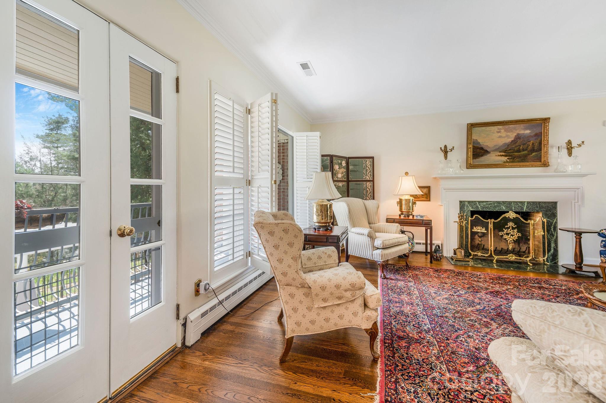 4 Dogwood Road Asheville, NC 28804 - Photo 14 of 48 a living room with furniture large window and a fireplace
