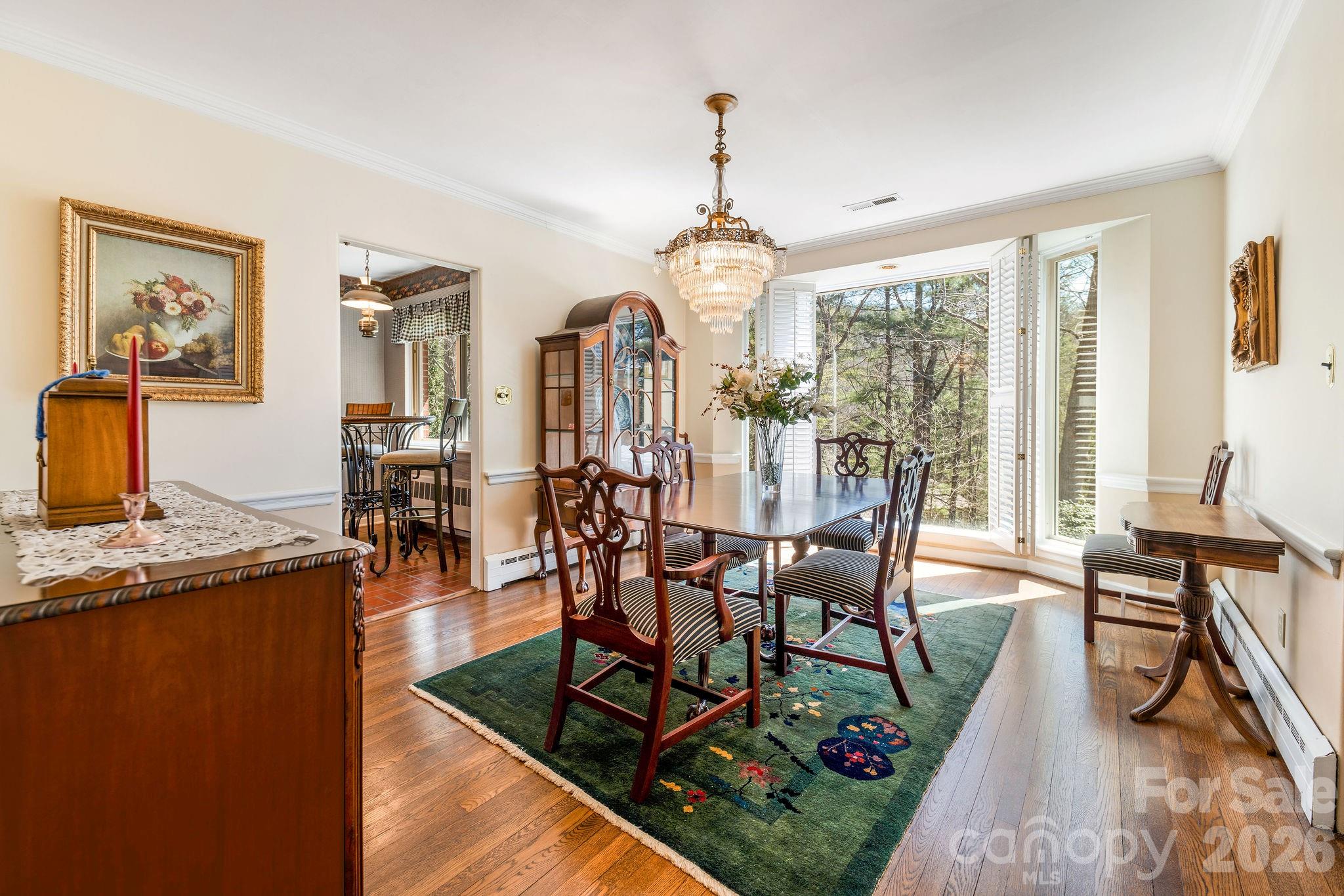 4 Dogwood Road Asheville, NC 28804 - Photo 23 of 48 a view of a dining room with furniture window and wooden floor