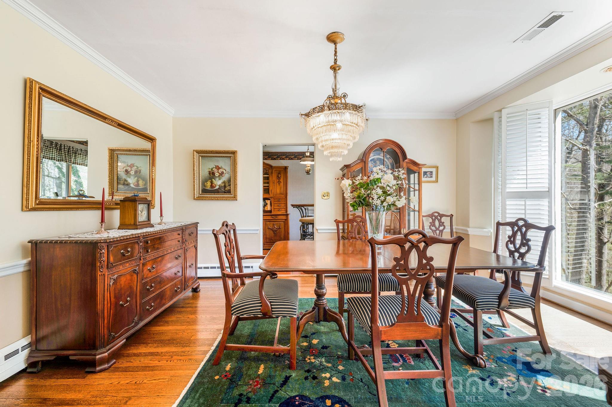 4 Dogwood Road Asheville, NC 28804 - Photo 24 of 48 a view of a dining room with furniture window and wooden floor