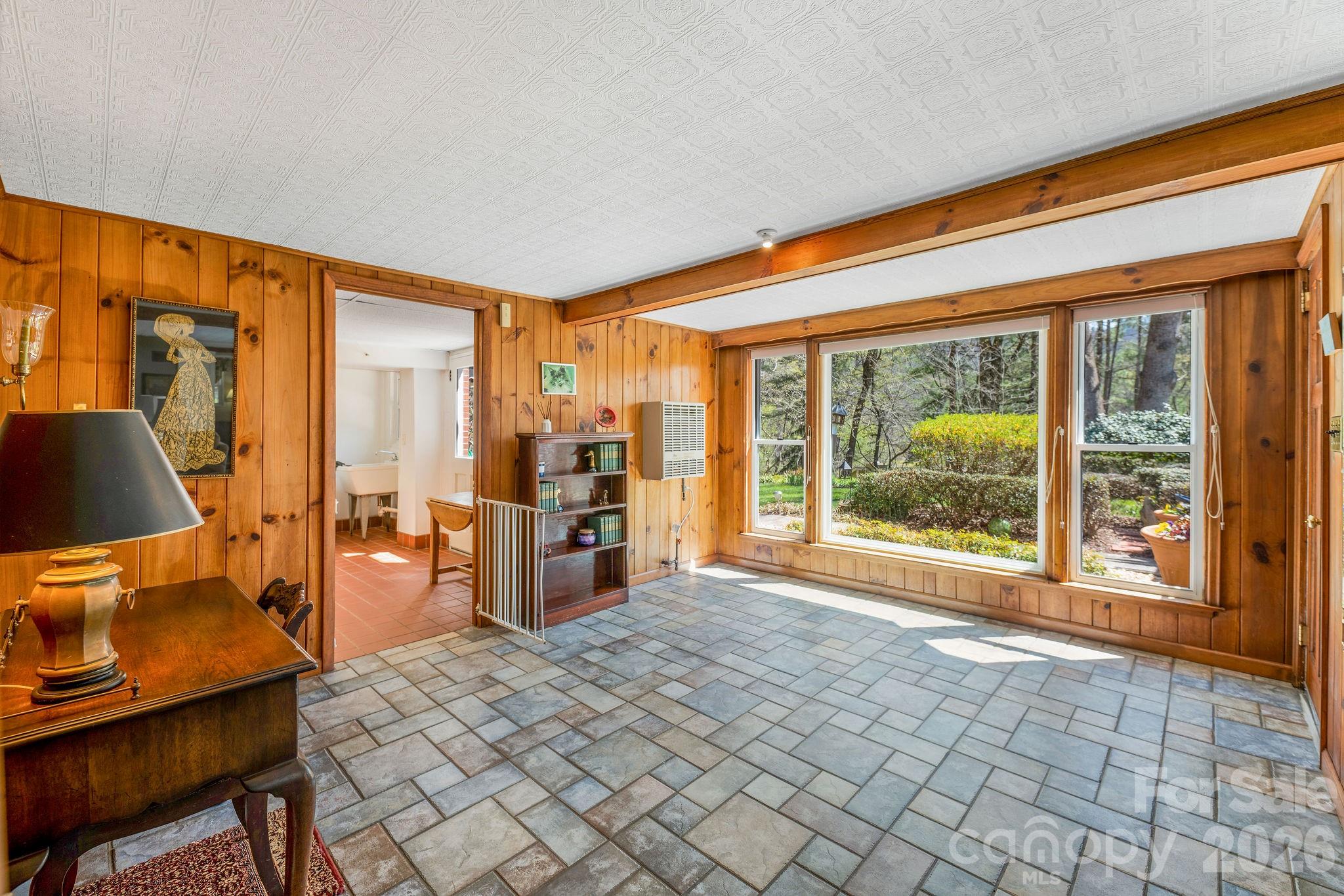 4 Dogwood Road Asheville, NC 28804 - Photo 39 of 48 a view of a bedroom with workspace and a window