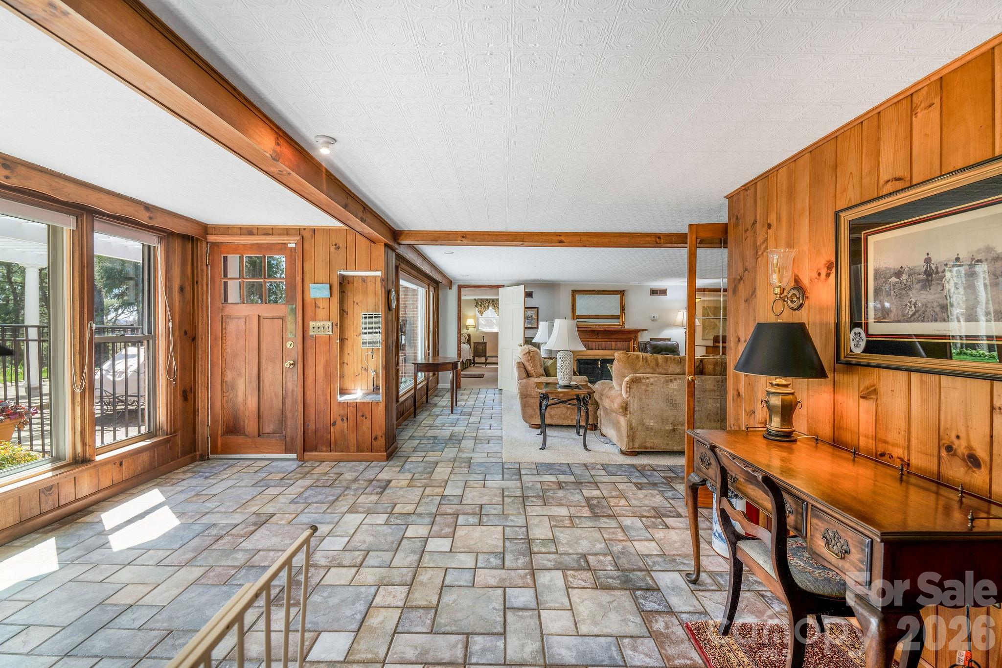 4 Dogwood Road Asheville, NC 28804 - Photo 40 of 48 a lobby with furniture and rug