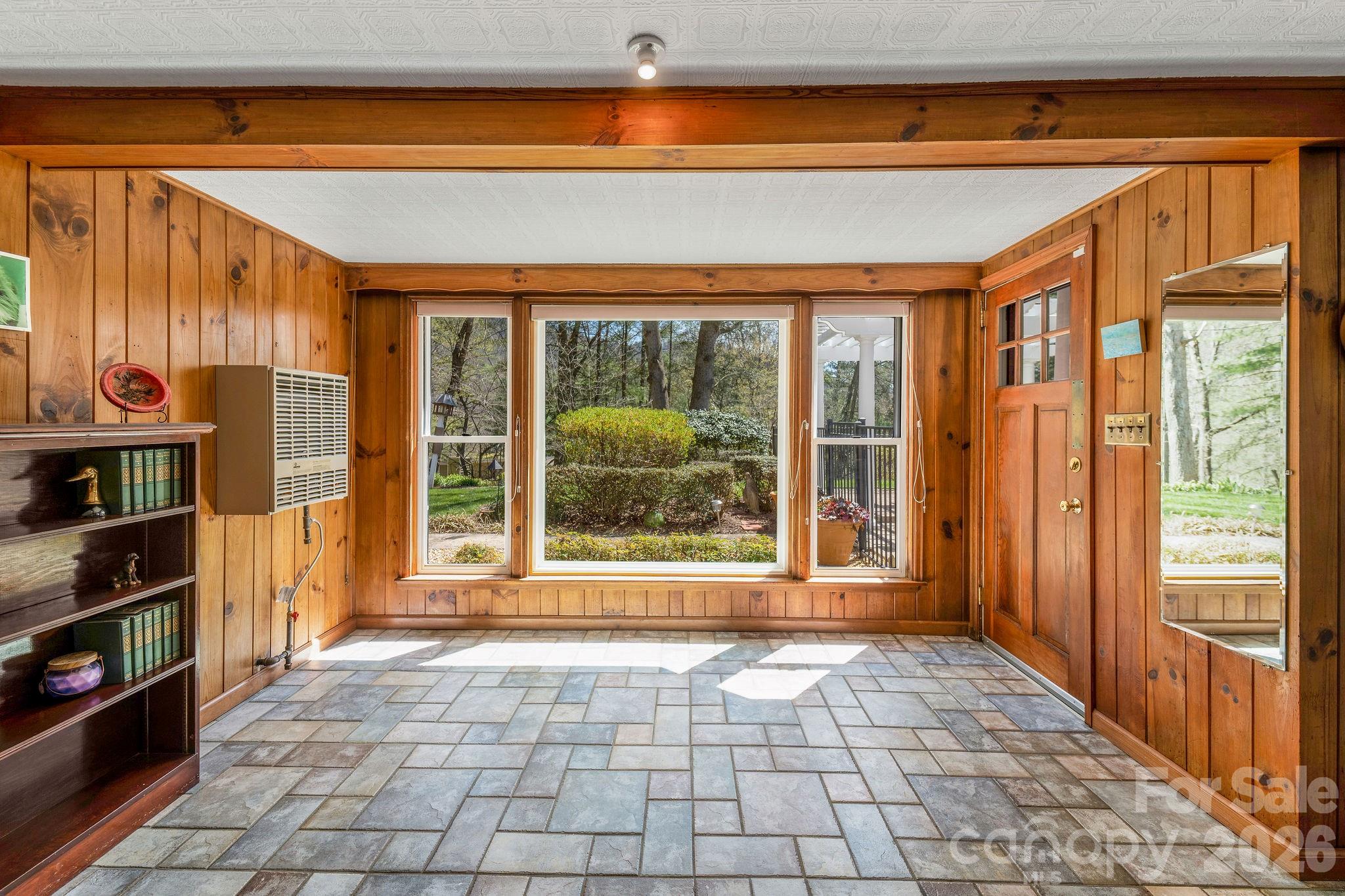 4 Dogwood Road Asheville, NC 28804 - Photo 41 of 48 a view of a entrance door of the house and window