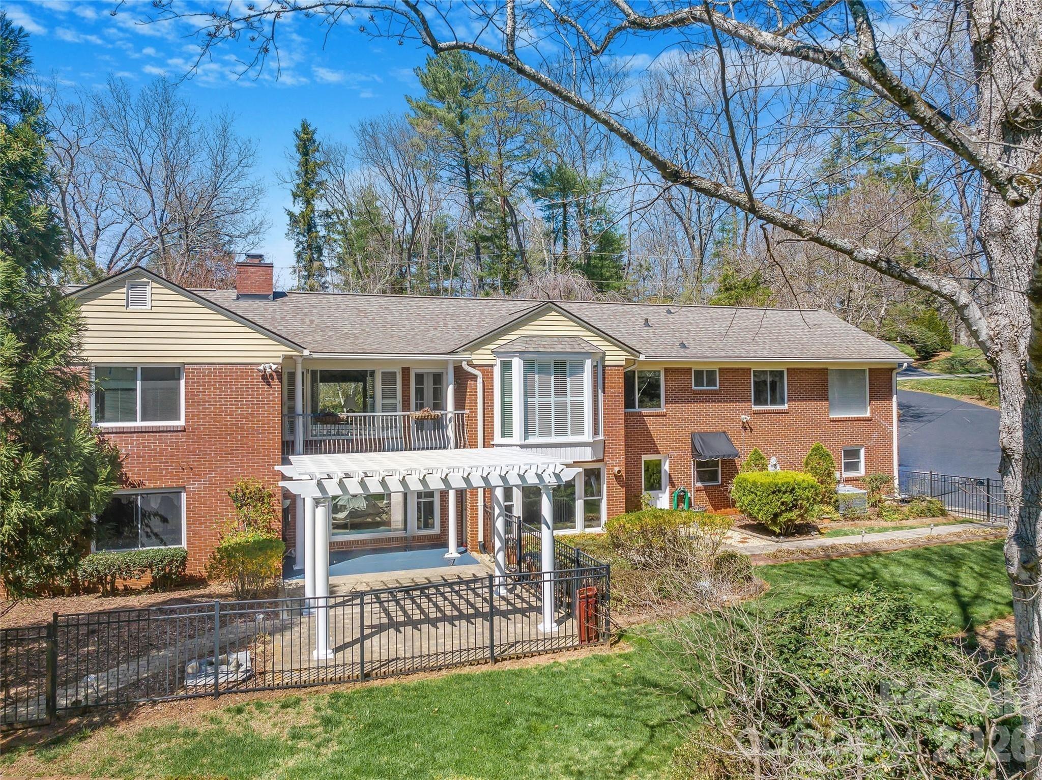 4 Dogwood Road Asheville, NC 28804 - Photo 5 of 48 a front view of a house with yard and green space