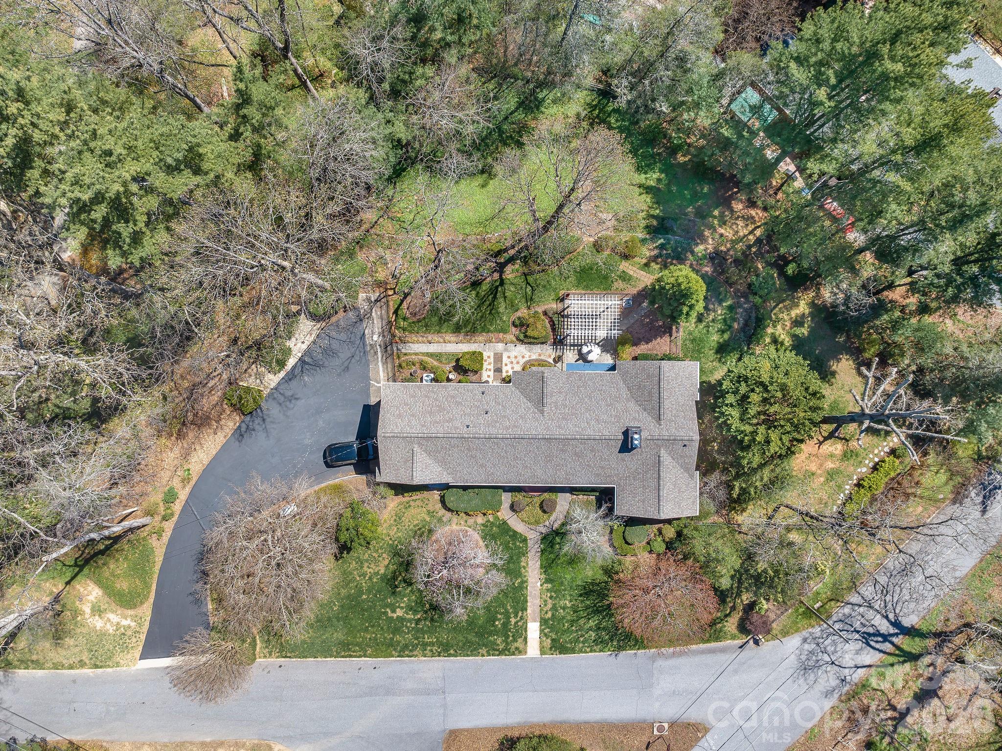 4 Dogwood Road Asheville, NC 28804 - Photo 7 of 48 an aerial view of a house with a yard
