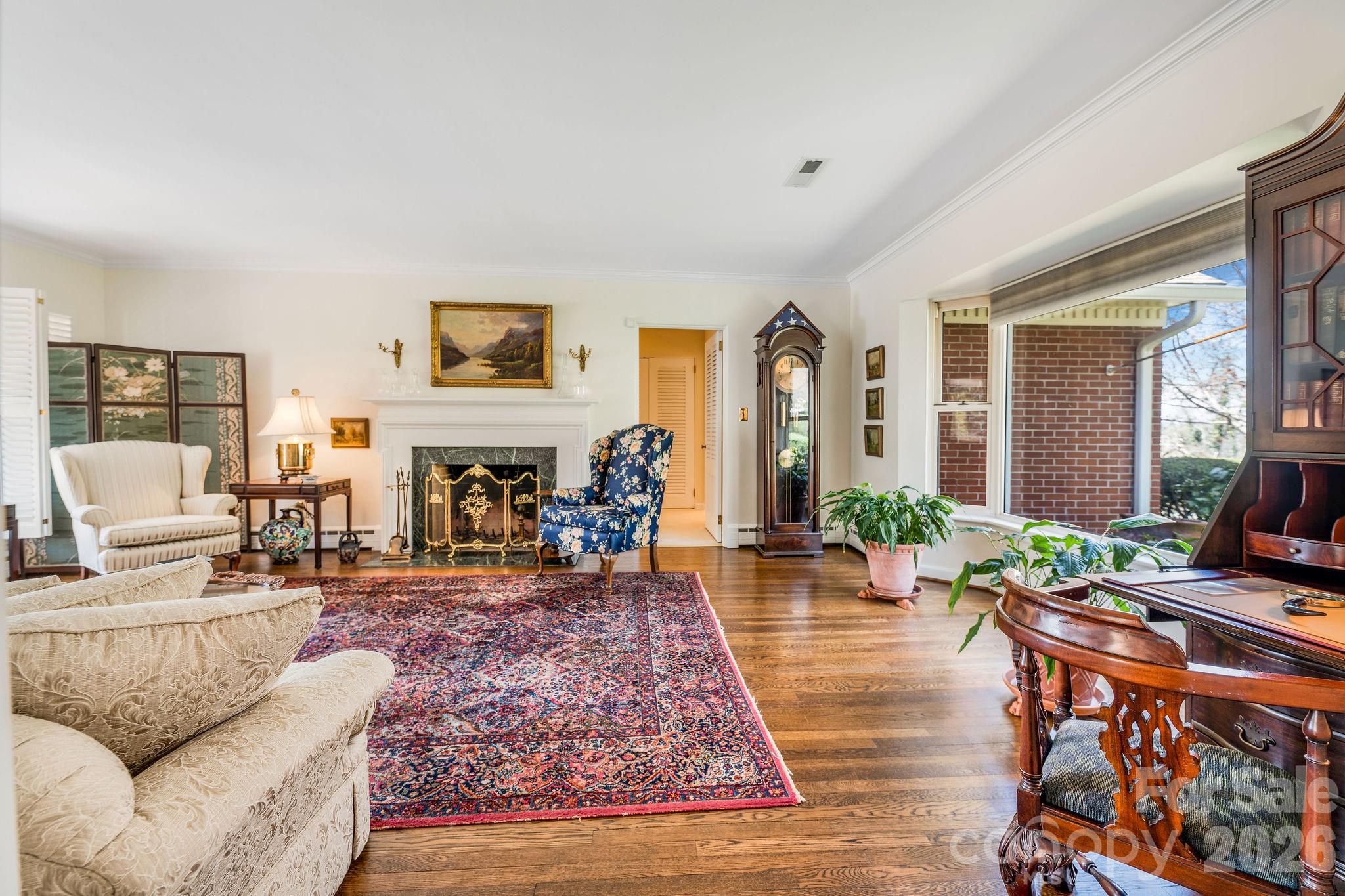 4 Dogwood Road Asheville, NC 28804 - Photo 10 of 48 a living room with furniture and a wooden floor