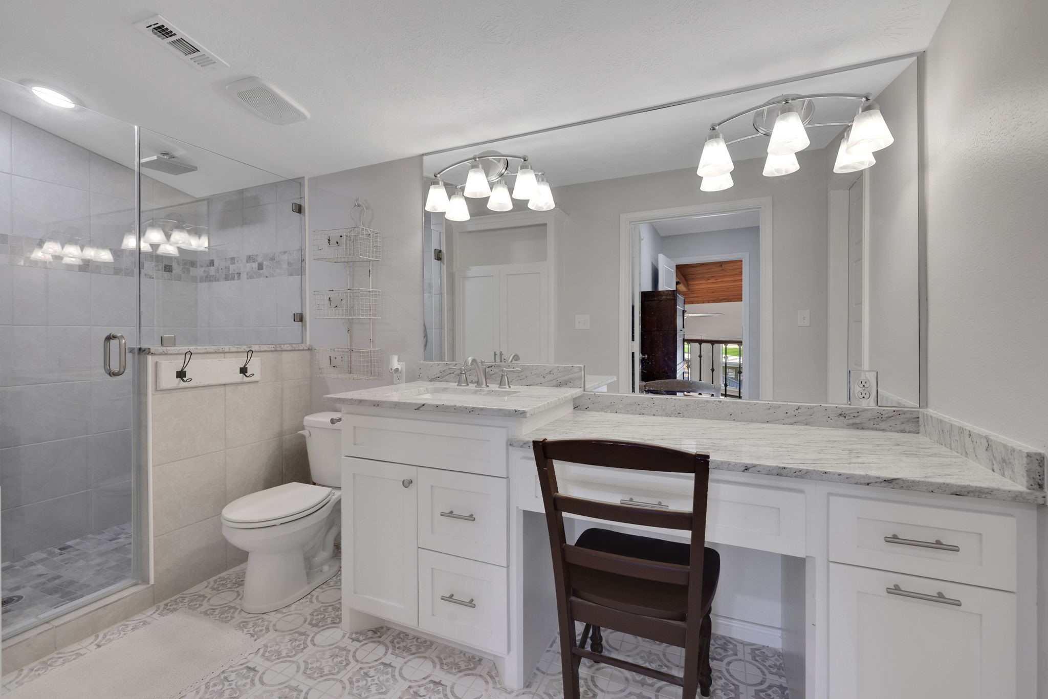 20 Ridgeway Drive Coldspring, TX 77331 - Photo 14 of 40 The vanity offers a seating area and plenty of lighting.