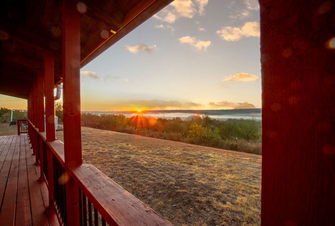 12516 Wire Road Leander, TX 78641 - Photo 28 of 40 a view of an ocean from a balcony