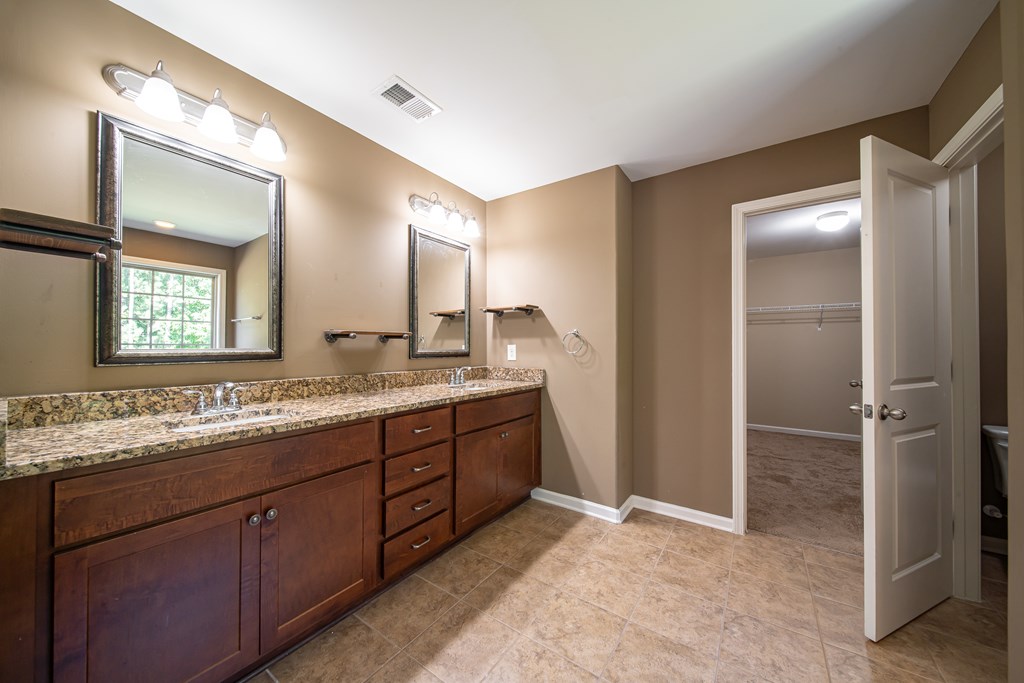 38 Pin Oak Way Hamilton, GA 31811 - Photo 41 of 50 a bathroom with a granite countertop sink mirror and double