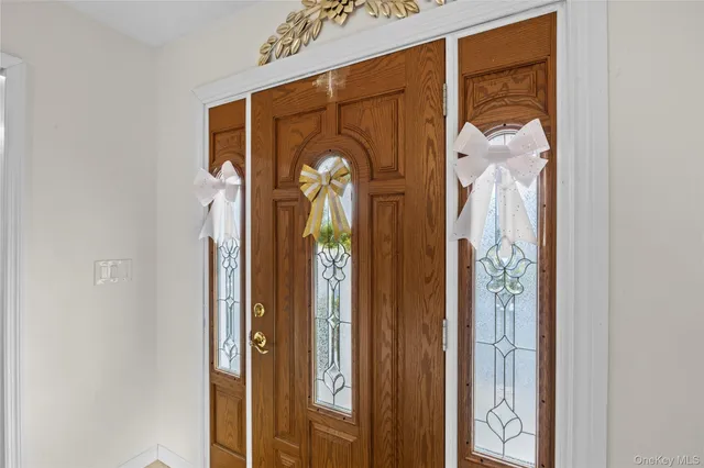 a front view of a house with a door and porch