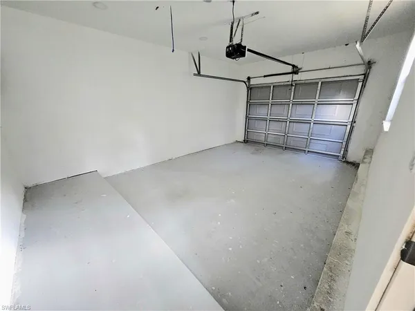a view of a porch with wooden floor and outdoor space