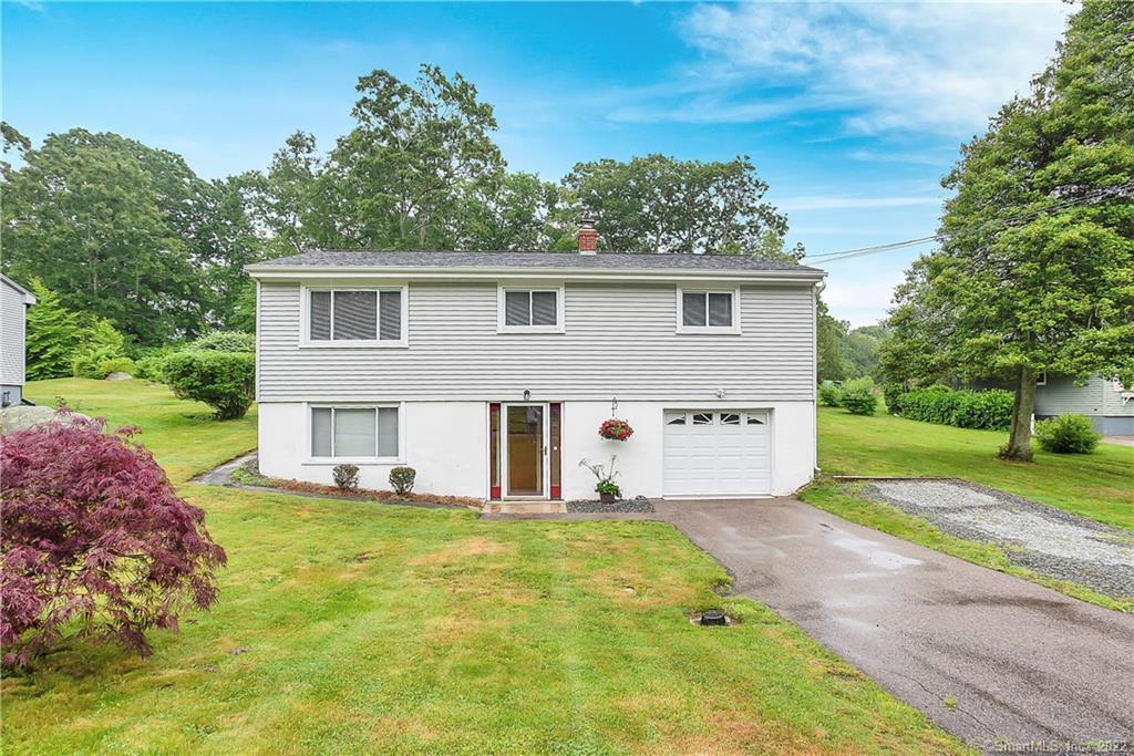 160 Flanders Road Stonington, CT 06378 - Photo 1 of 1 a view of a house with a yard