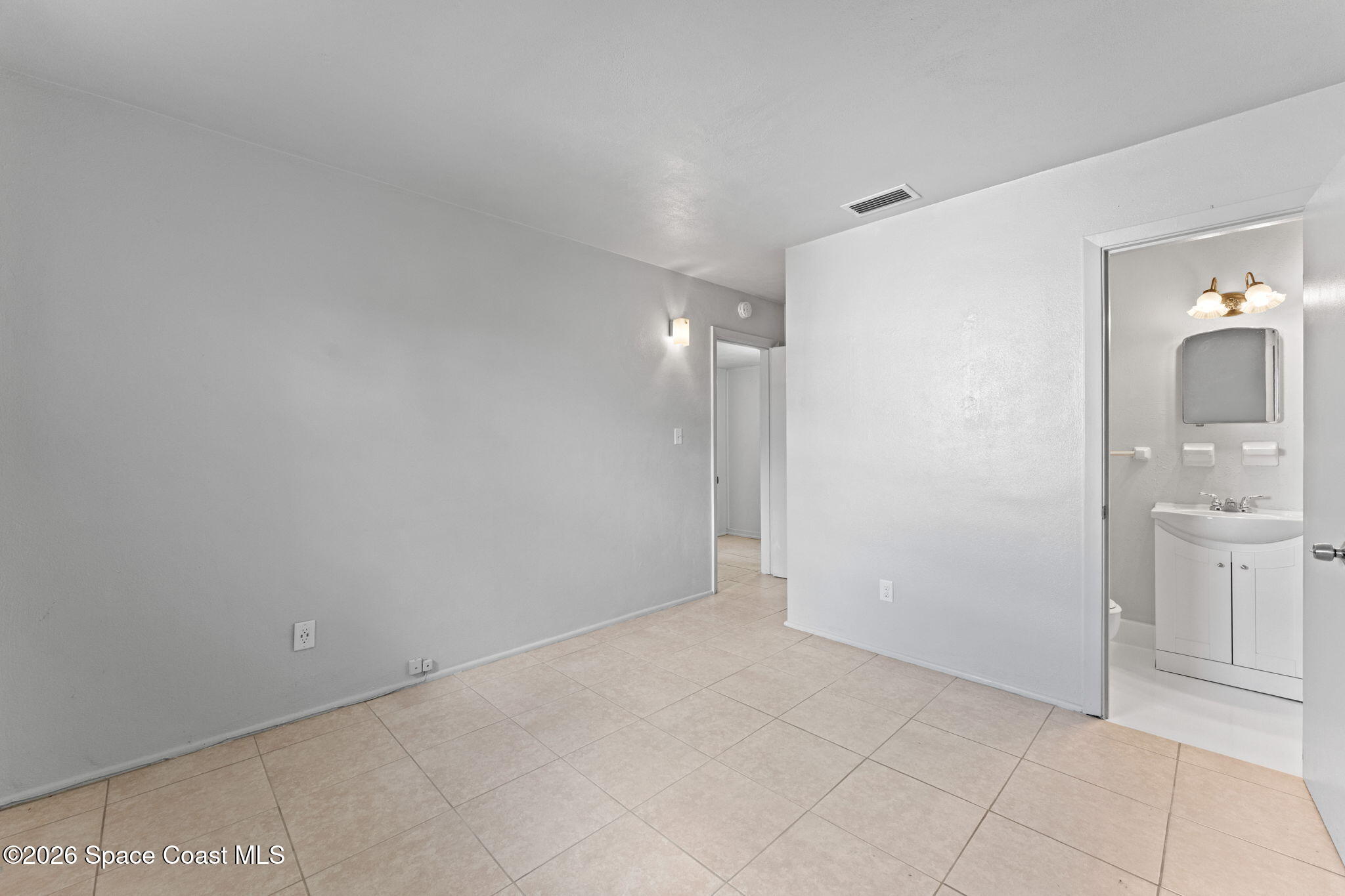 1042 Azalea Lane Cocoa, FL 32922 - Photo 17 of 26 a view of an empty room