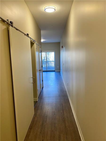 1655 Fifth Avenue, Unit 605 Pittsburgh, PA 15219 - Photo 10 of 19 a view of a hallway with wooden floor