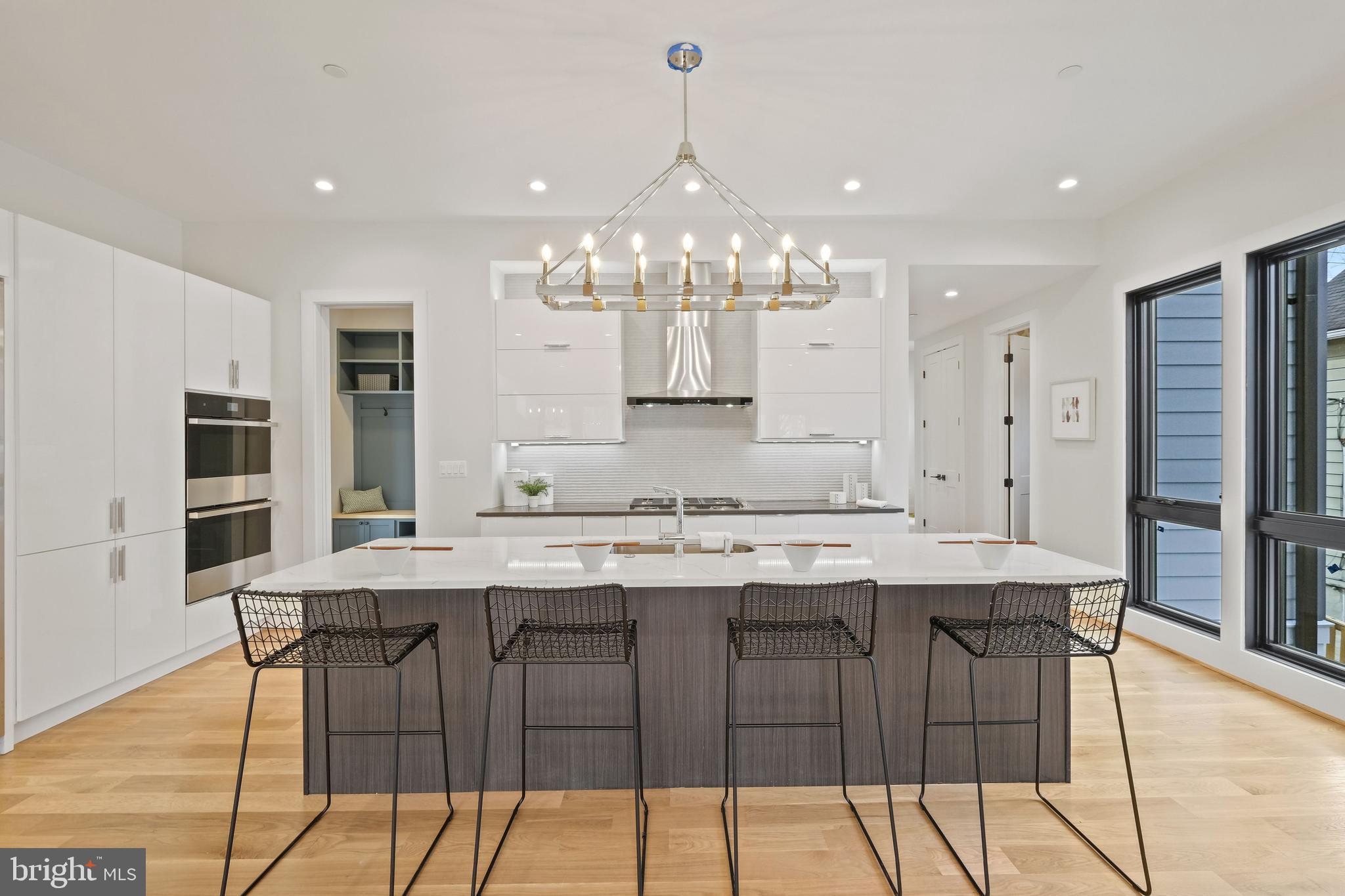 705 Silver Spring Avenue Silver Spring, MD 20910 - Photo 13 of 58 Sleek Chimney Wall Hood + Large Island w/Seating