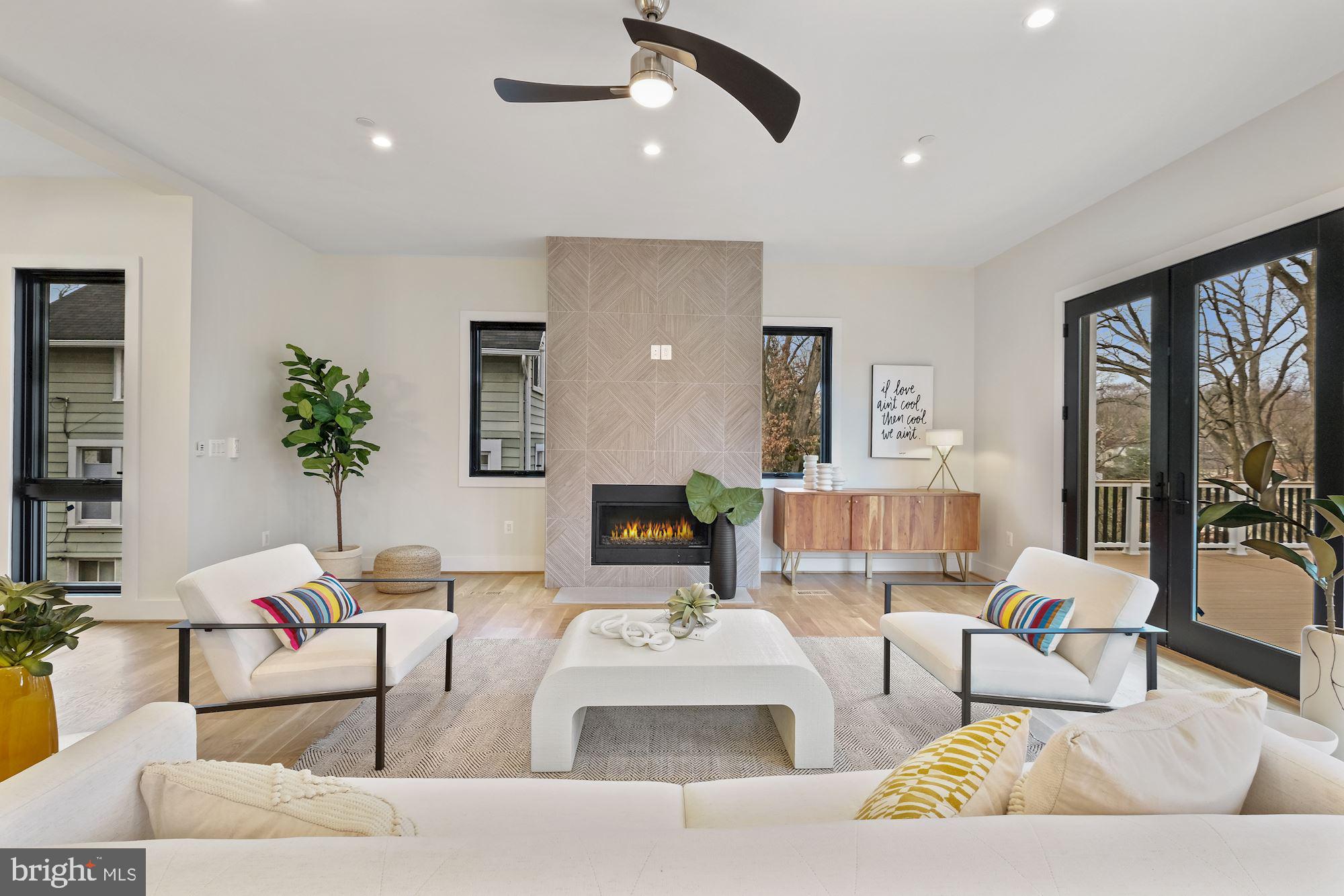 705 Silver Spring Avenue Silver Spring, MD 20910 - Photo 18 of 58 with a gorgeous gas fireplace w/custom tile