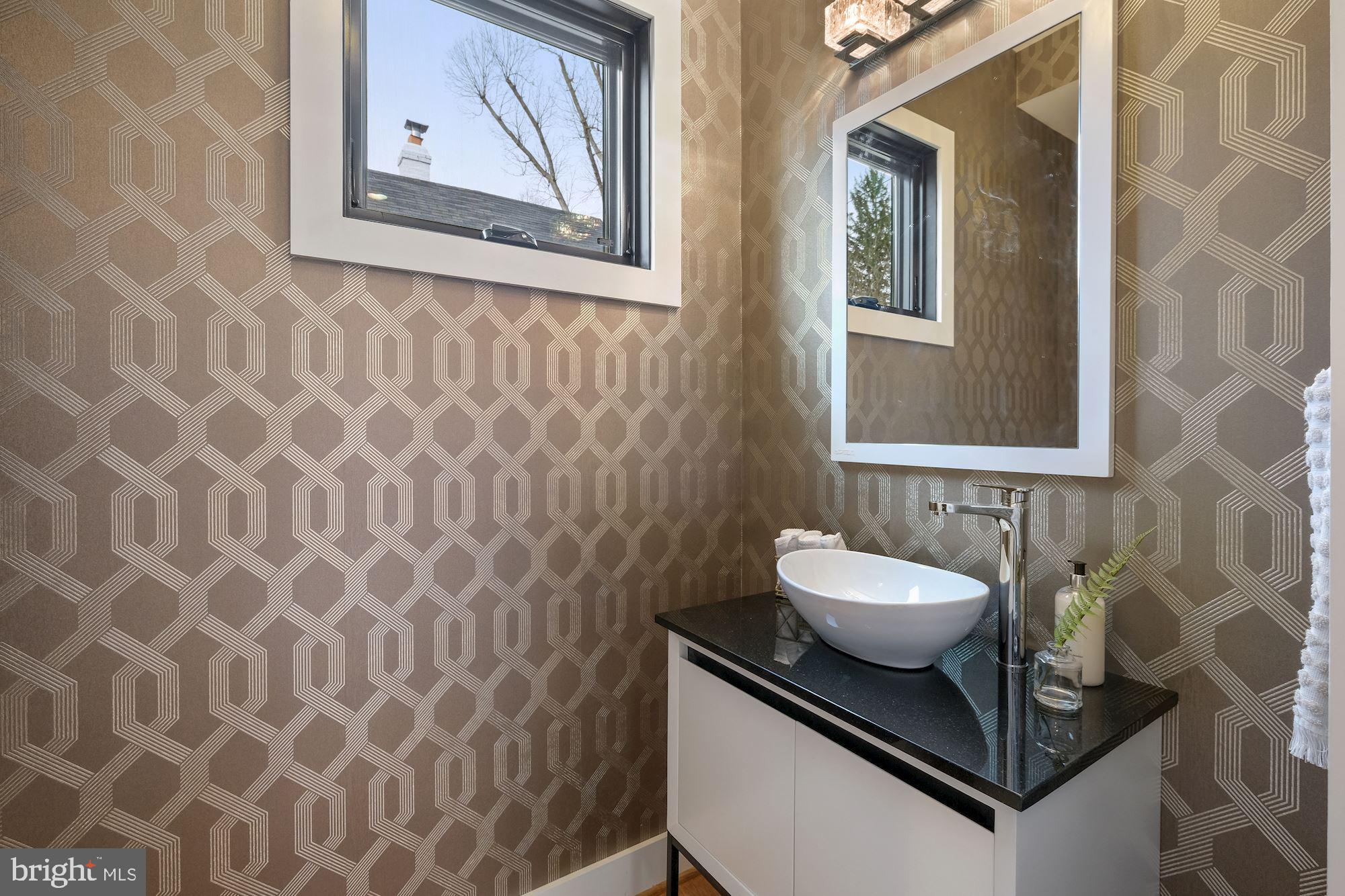 705 Silver Spring Avenue Silver Spring, MD 20910 - Photo 26 of 58 and powder room with designer vanity & wallpaper.