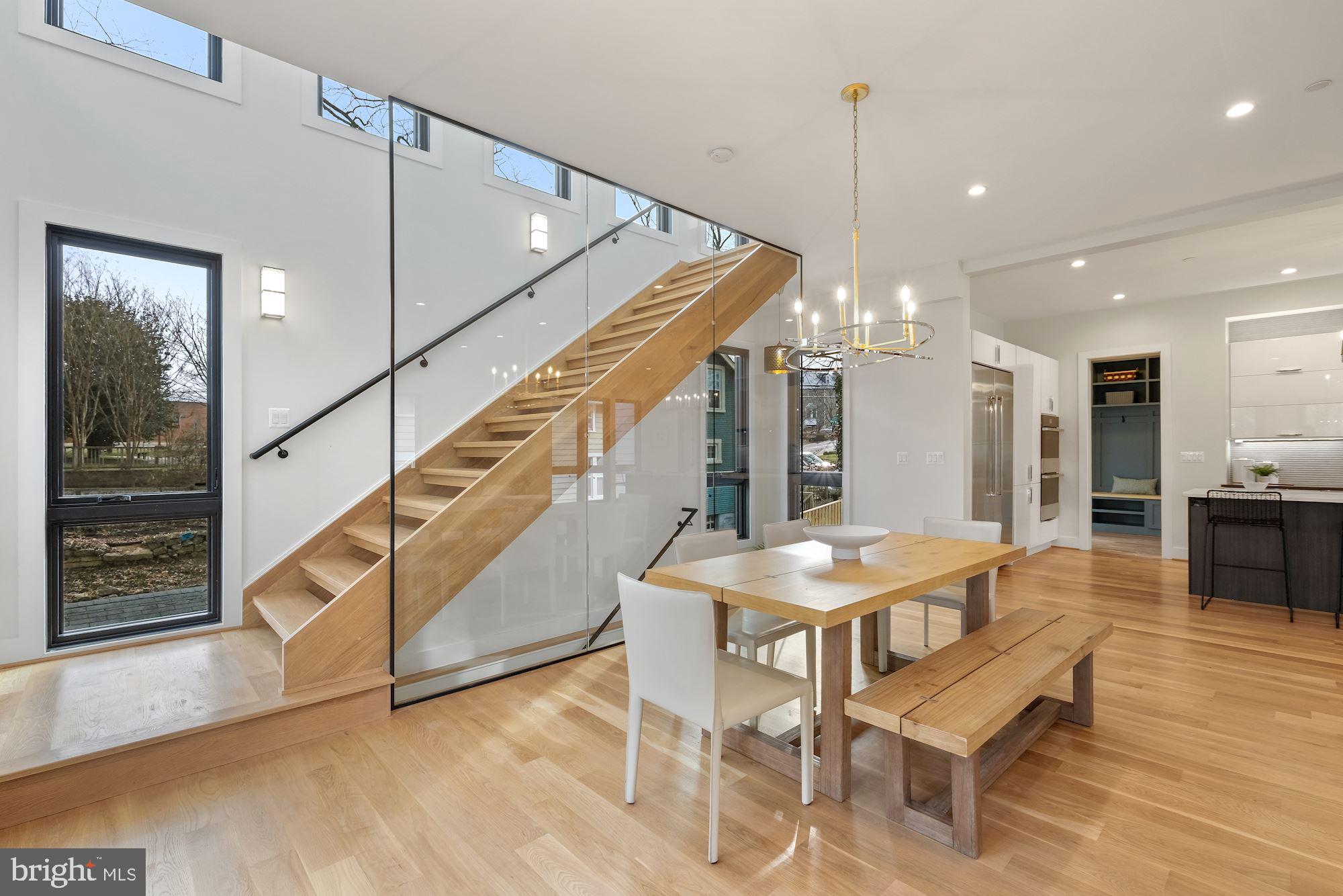 705 Silver Spring Avenue Silver Spring, MD 20910 - Photo 28 of 58 along the avant-garde floating glass stairwell