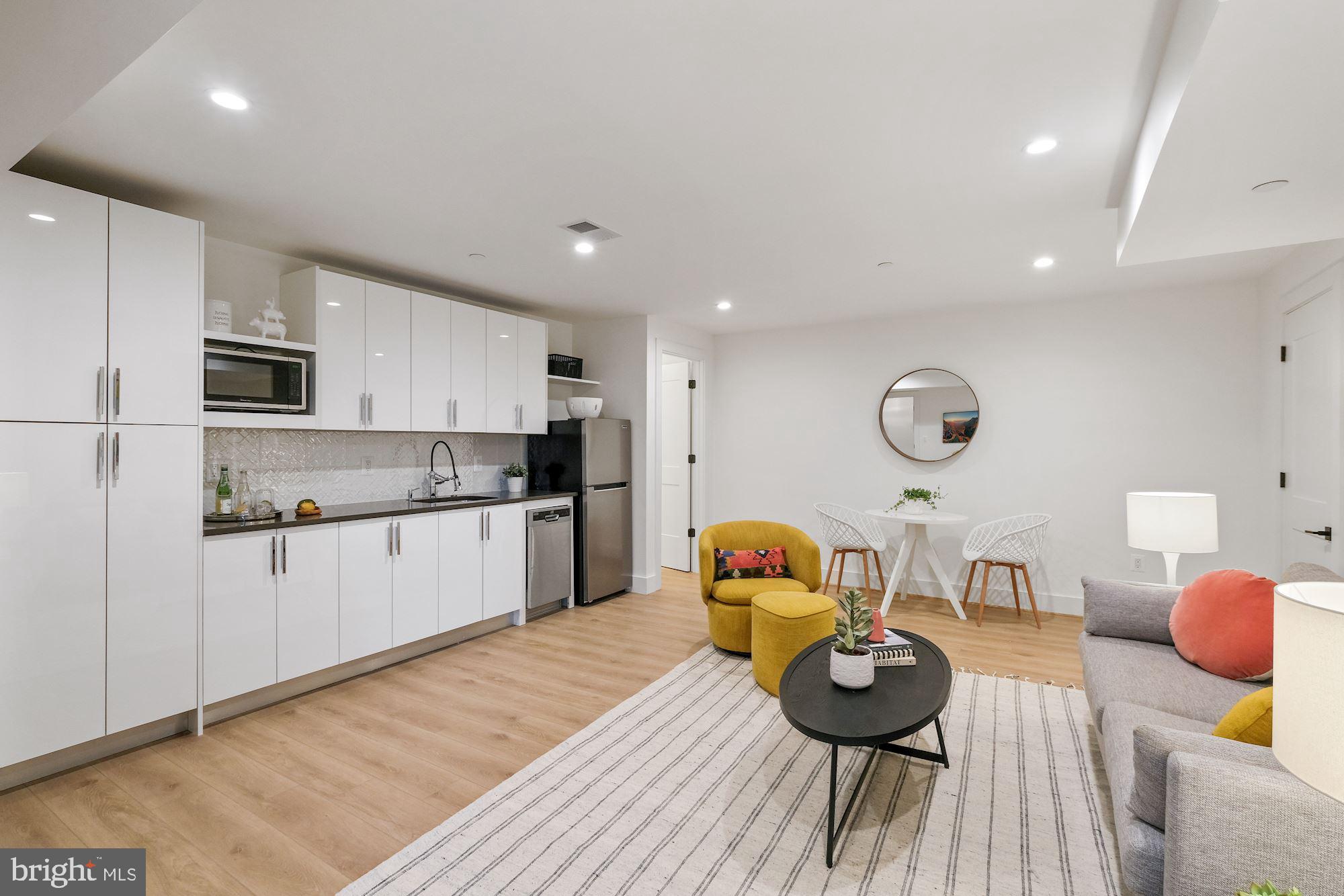 705 Silver Spring Avenue Silver Spring, MD 20910 - Photo 45 of 58 w/COREtec vinyl plank flooring & kitchenette