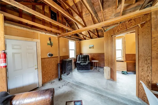 a view of livingroom with furniture and a window