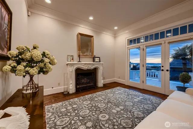 a living room with a couch and a fireplace