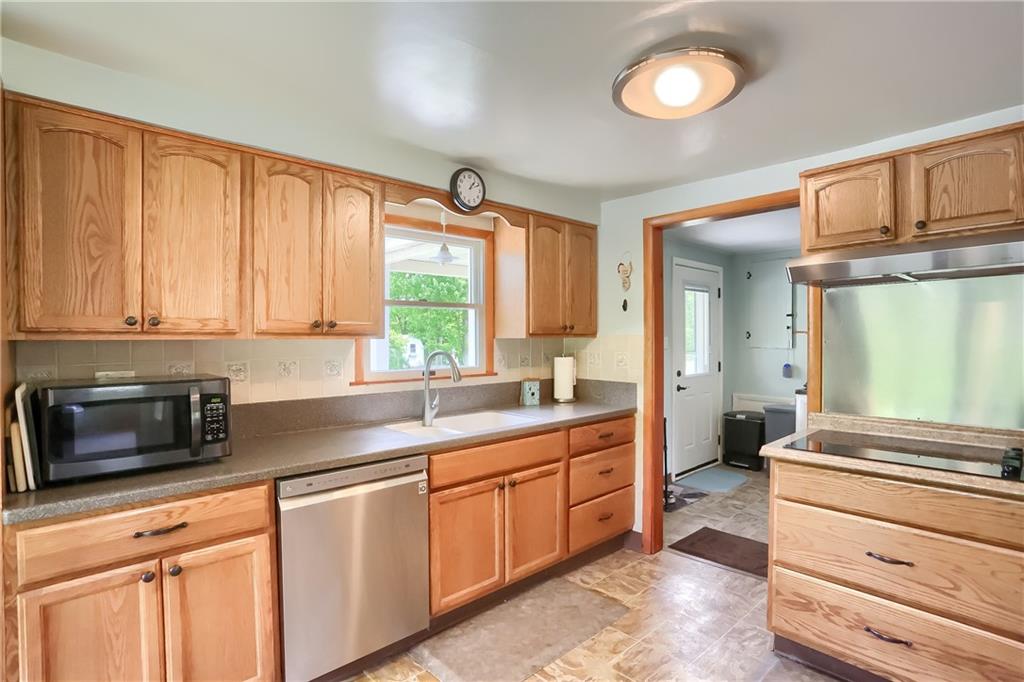119 Lovi Road Baden, PA 15005 - Photo 11 of 41 a kitchen with a sink stove and cabinets