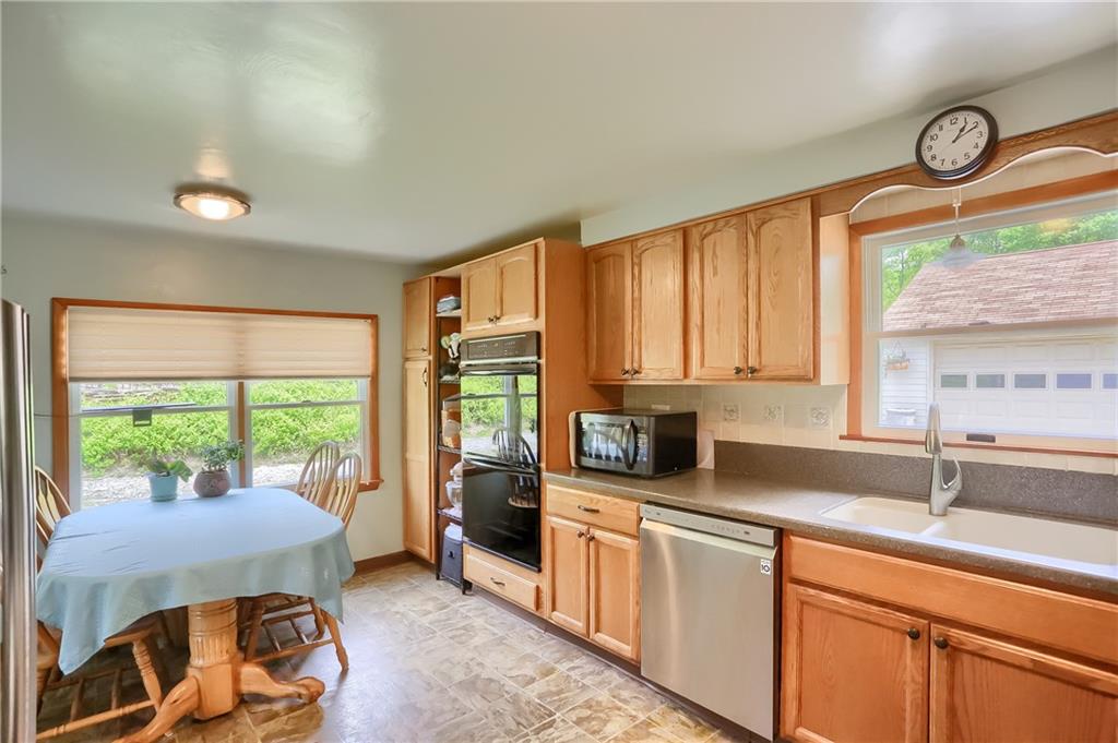 119 Lovi Road Baden, PA 15005 - Photo 12 of 41 a kitchen with a sink and a large window