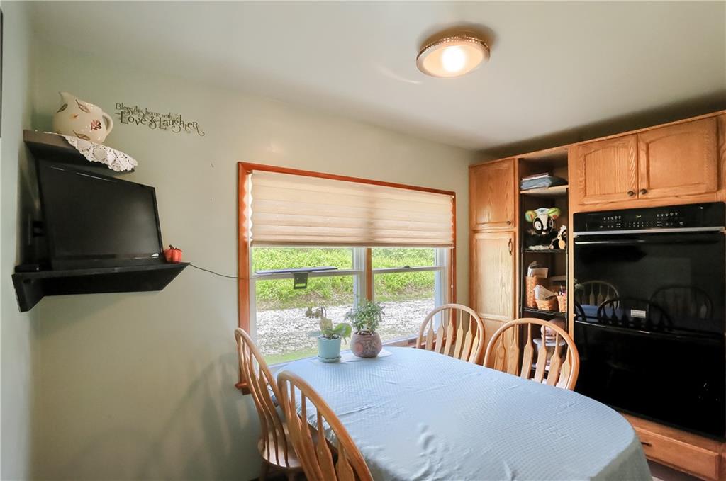 119 Lovi Road Baden, PA 15005 - Photo 14 of 41 a view of a dining room with furniture window and outside view