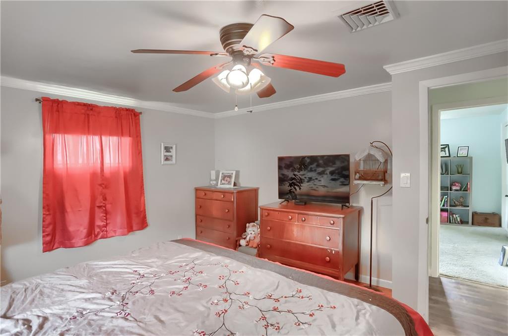 119 Lovi Road Baden, PA 15005 - Photo 24 of 41 a bedroom with furniture and a chandelier