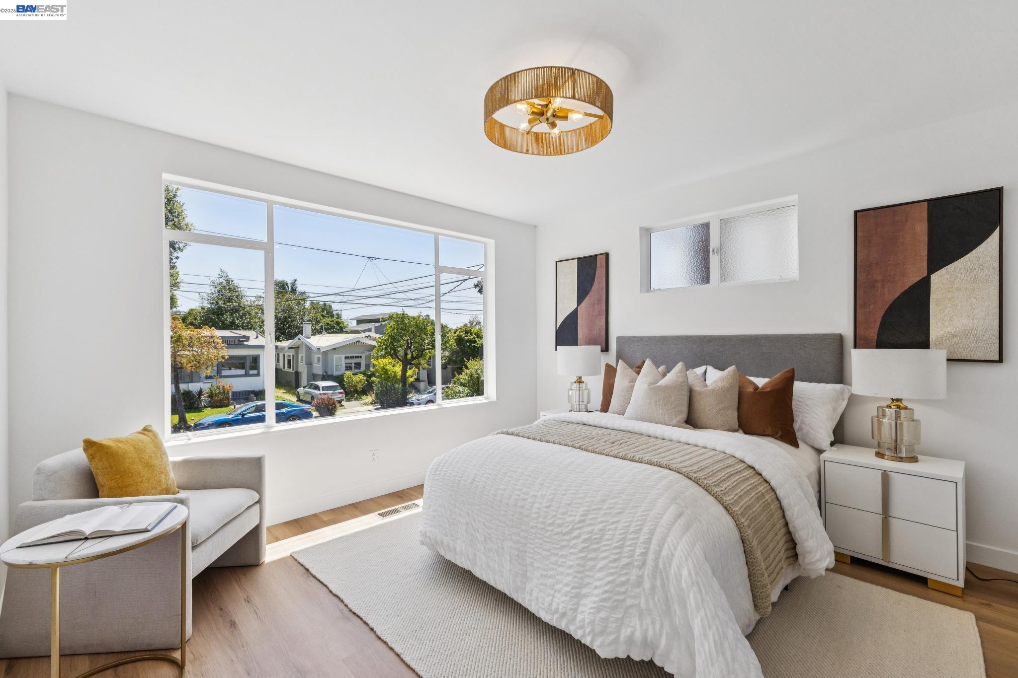 1219 Pearl Street Alameda, CA 94501 - Photo 13 of 40 a bedroom with a bed and a large window