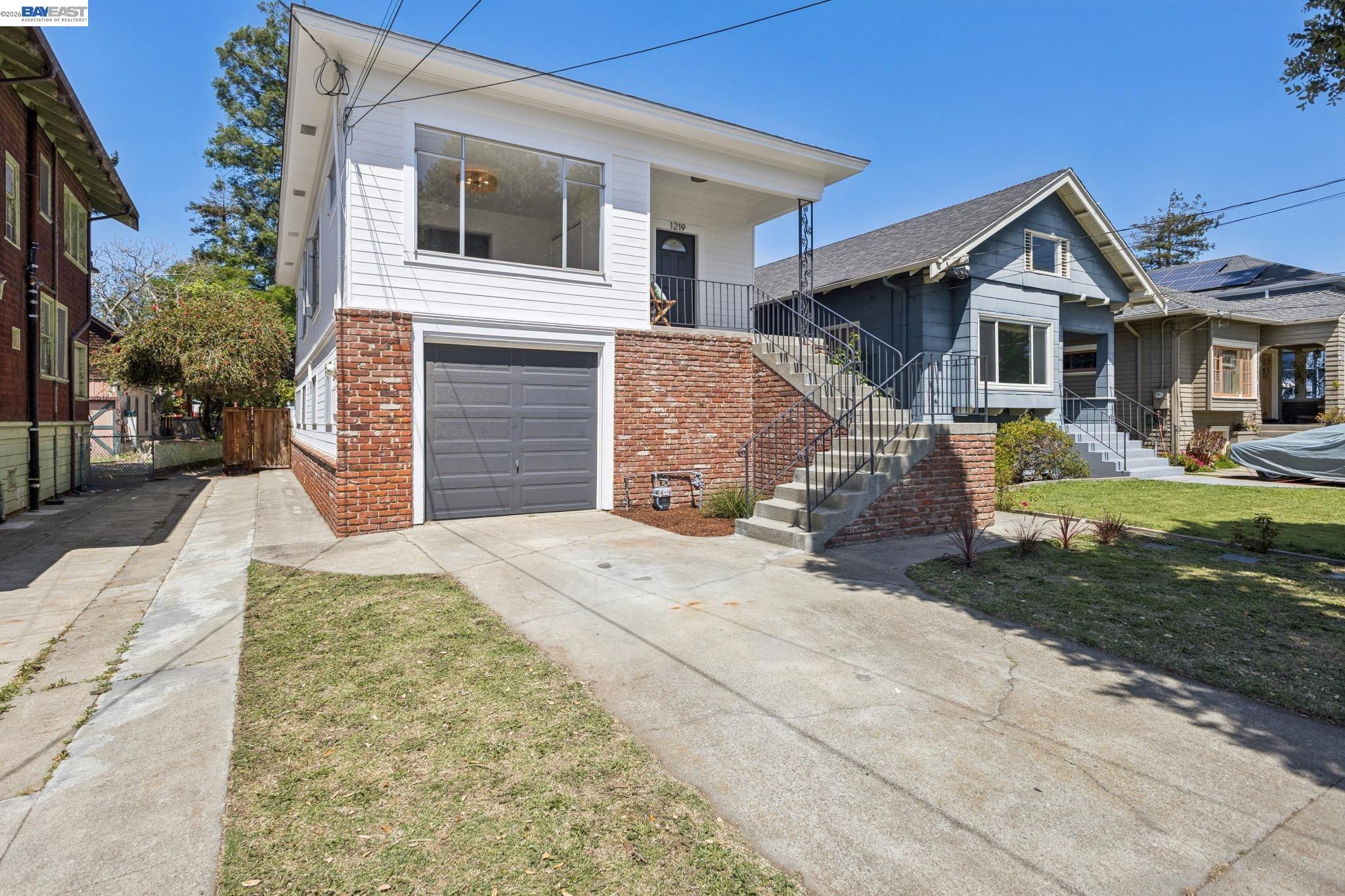 1219 Pearl Street Alameda, CA 94501 - Photo 39 of 40 a front view of a house with a yard