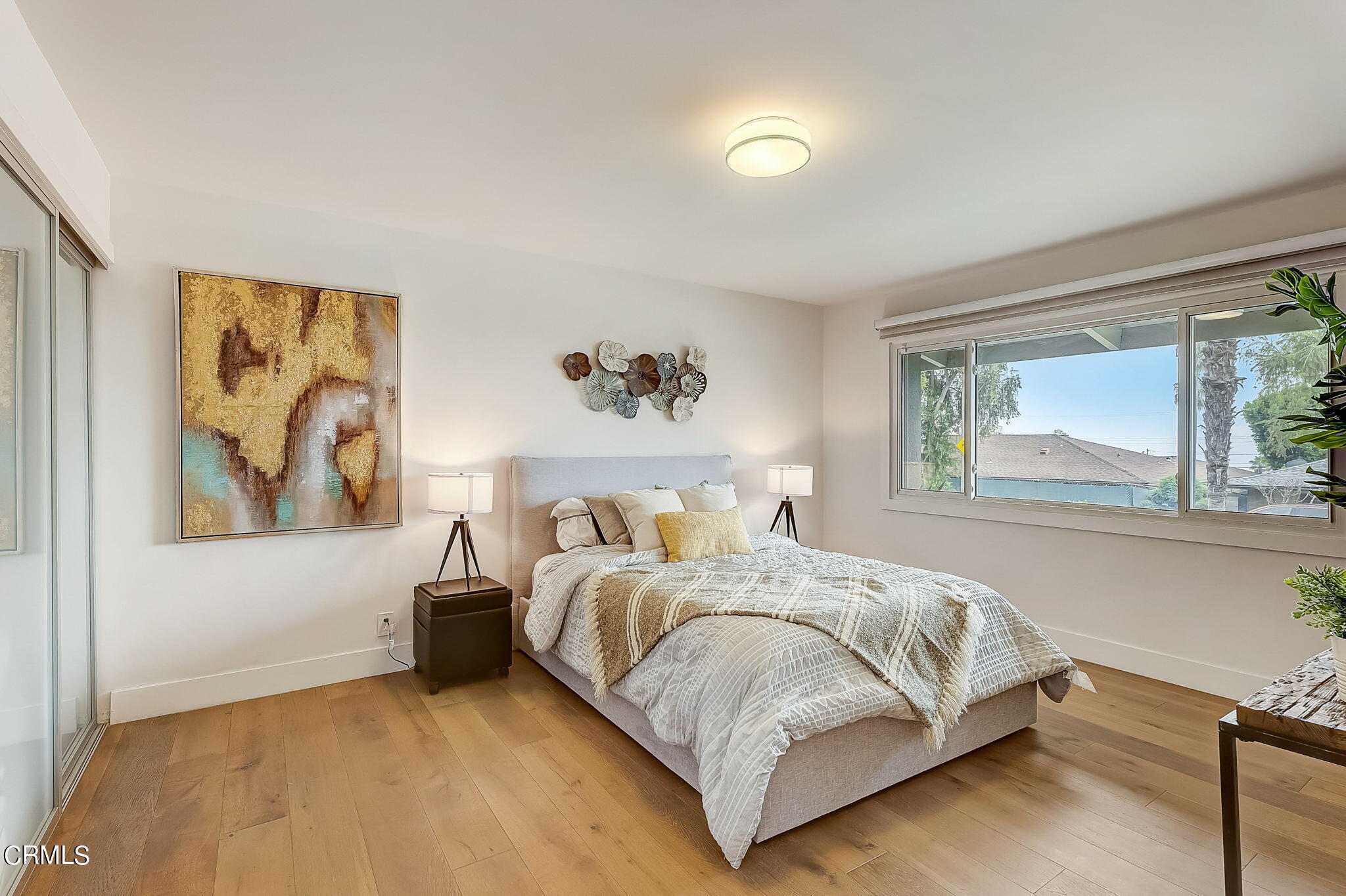 3785 Ranch Top Road Pasadena, CA 91107 - Photo 14 of 39 a bedroom with a bed and a painting on the wall