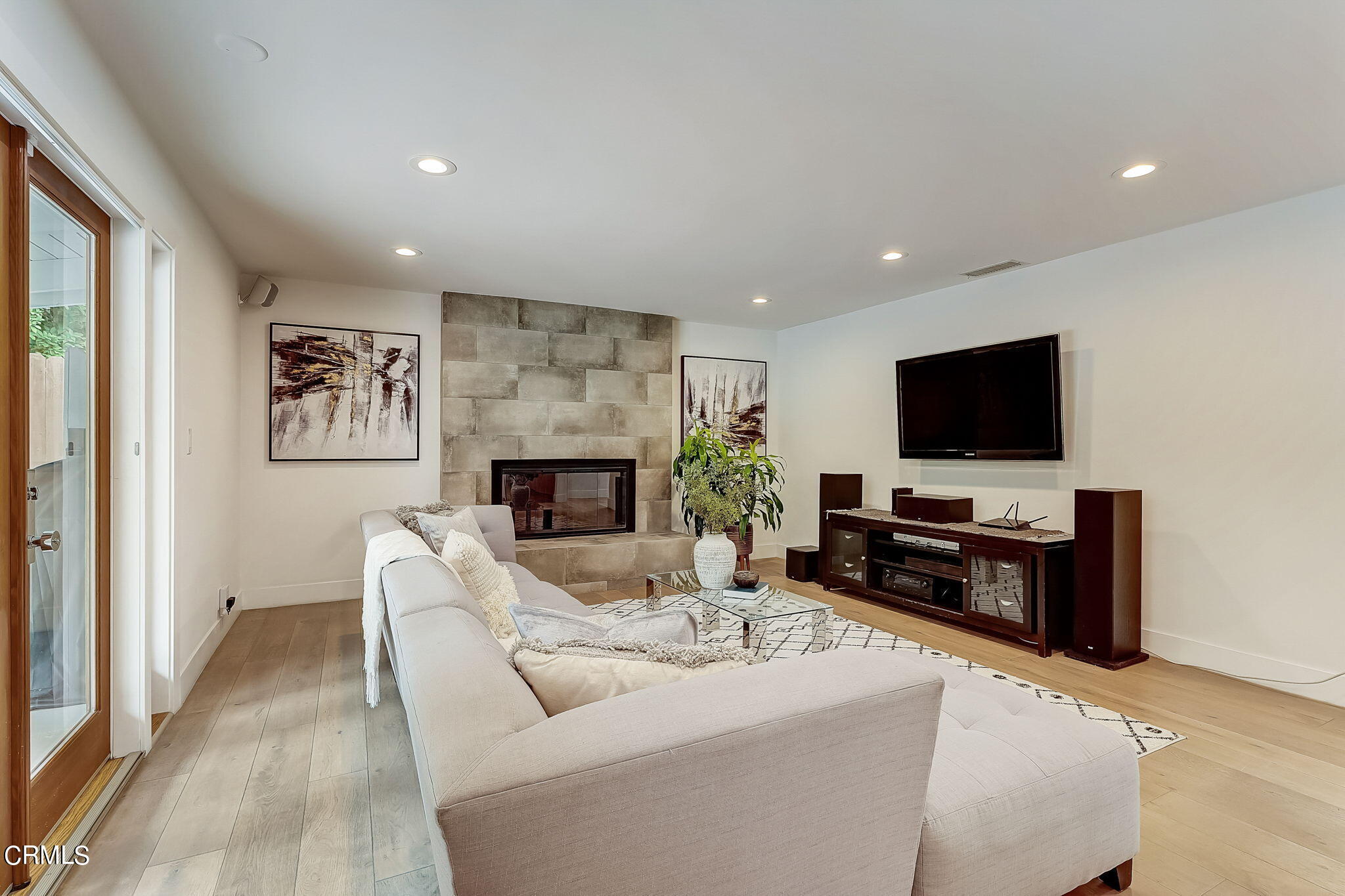 3785 Ranch Top Road Pasadena, CA 91107 - Photo 16 of 39 a living room with furniture and a flat screen tv