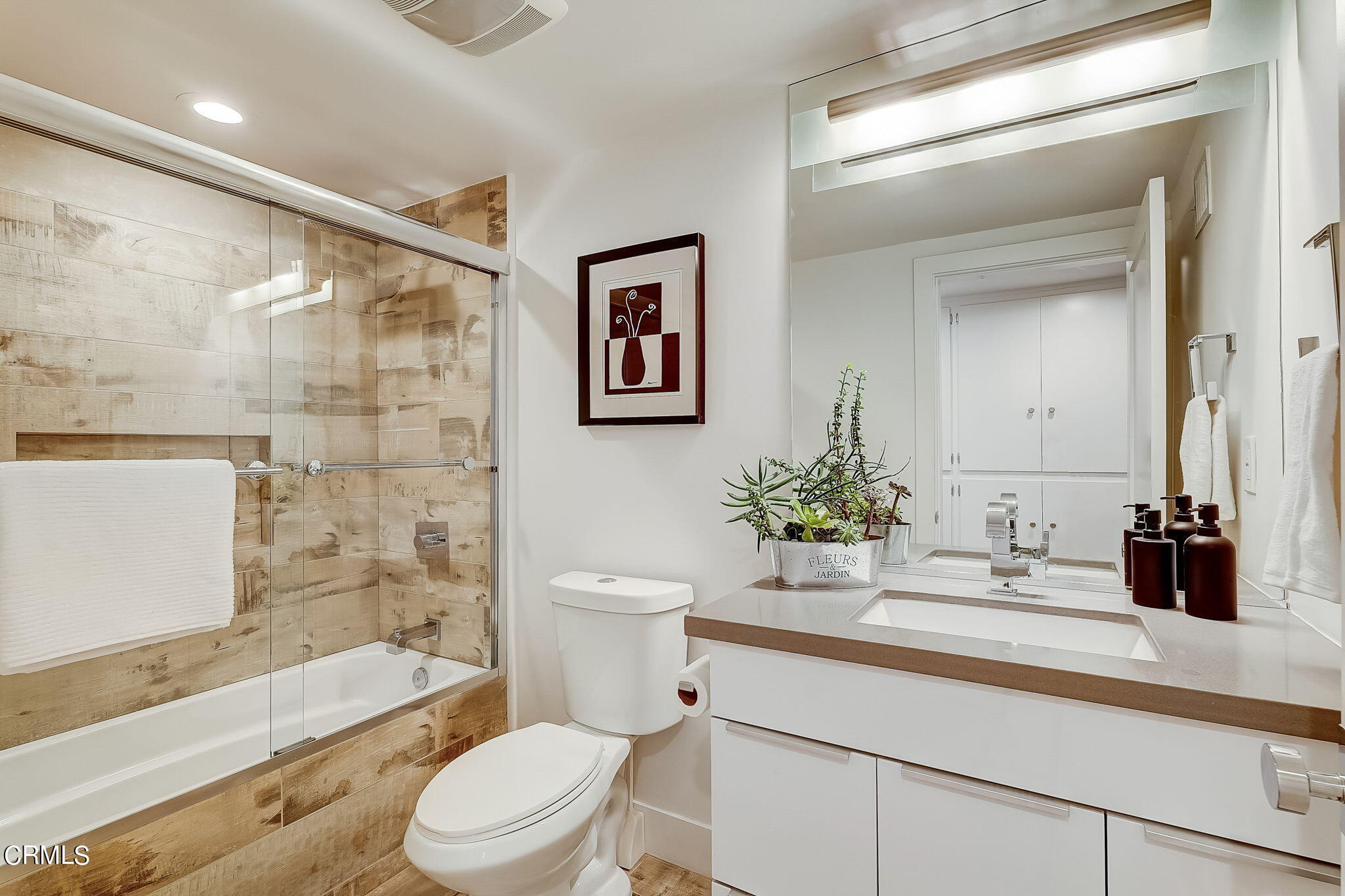 3785 Ranch Top Road Pasadena, CA 91107 - Photo 17 of 39 a bathroom with a sink a toilet a mirror and shower