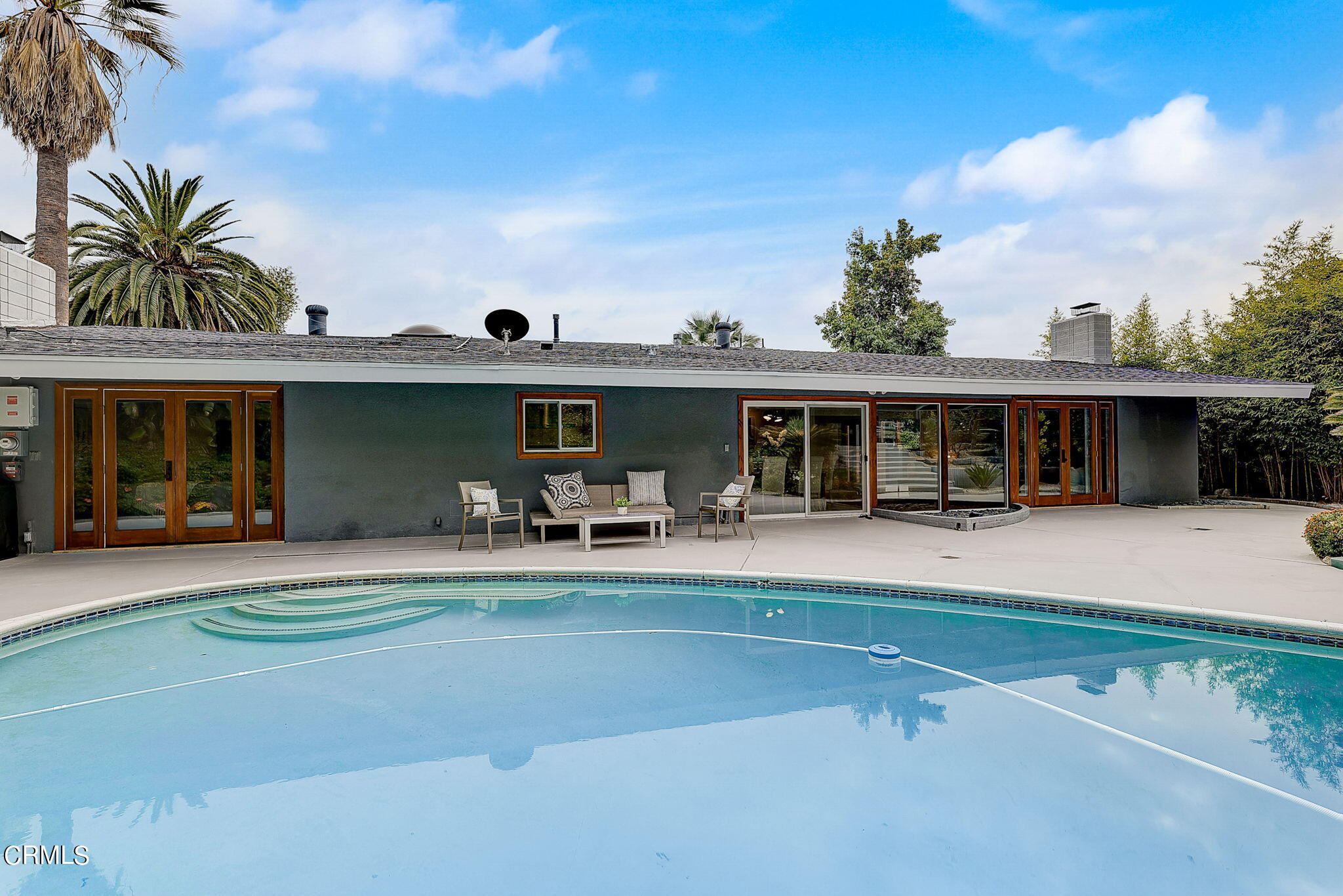 3785 Ranch Top Road Pasadena, CA 91107 - Photo 28 of 39 a front view of a house with swimming pool and furniture