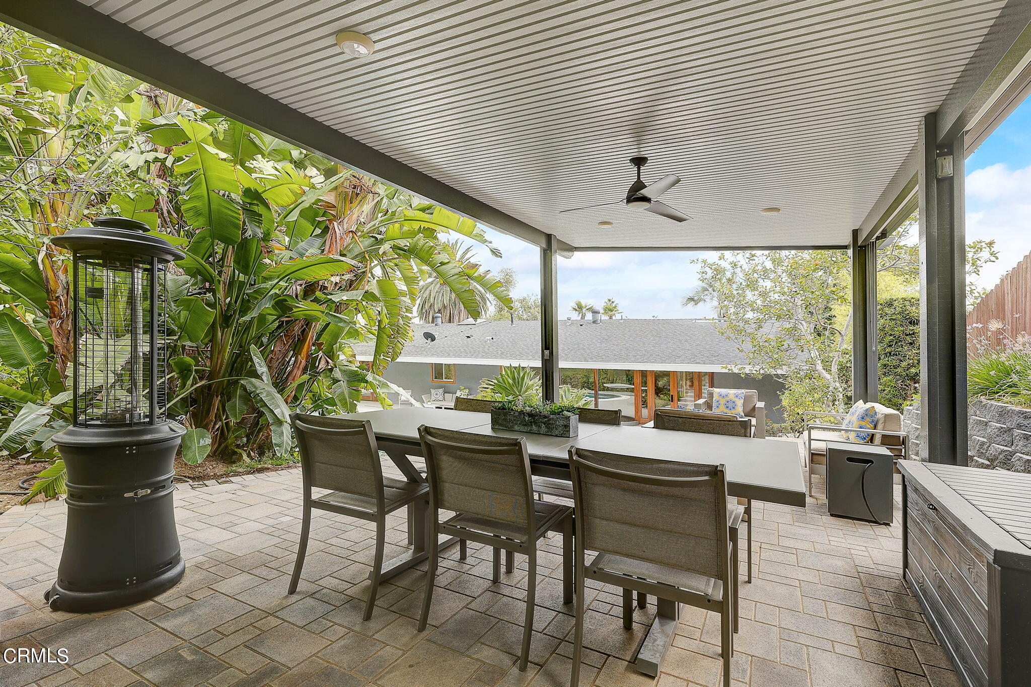3785 Ranch Top Road Pasadena, CA 91107 - Photo 32 of 39 a dining room with furniture and large windows