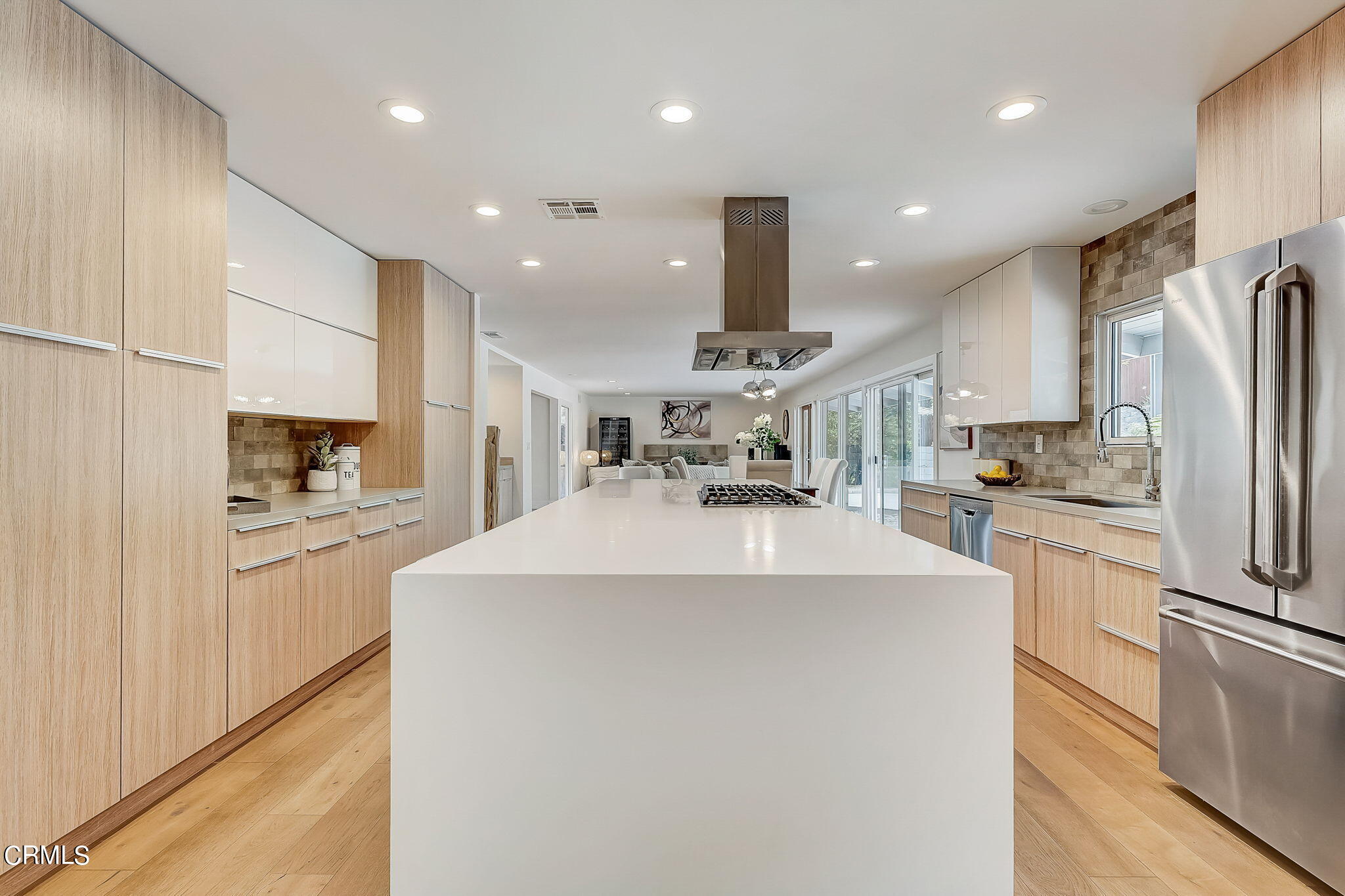 3785 Ranch Top Road Pasadena, CA 91107 - Photo 9 of 39 a large kitchen with stainless steel appliances kitchen island a stove a refrigerator a oven and a sink with large cabinets