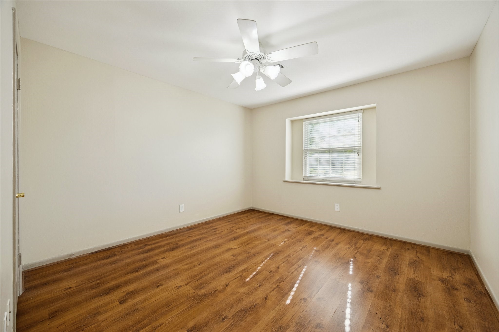 10718 Inwood Drive Houston, TX 77042 - Photo 19 of 20 Another secondary bedroom, also with a view toward the front yard. The closet is to the far left.