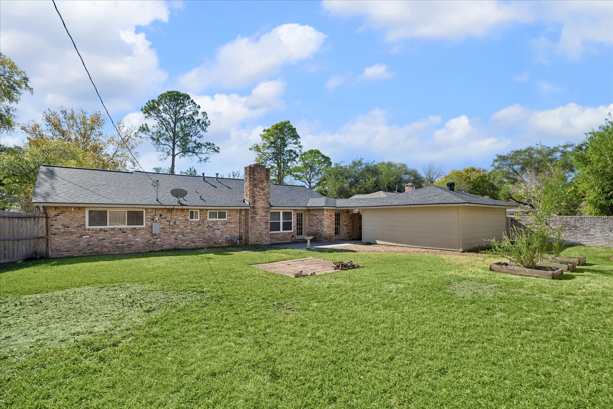 10718 Inwood Drive Houston, TX 77042 - Photo 4 of 20 What a backyard! Plenty of room for play, exercise, grilling, hobbies, gardening, etc. You name it, this backyard space can accommodate your goals!