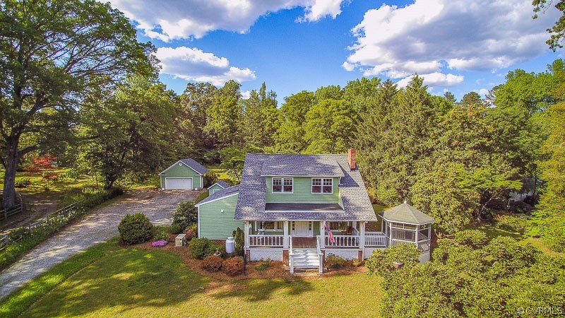 8088 Nelson Ridge Drive Hanover, VA 23069 - Photo 1 of 50 a aerial view of a house with swimming pool next to a yard
