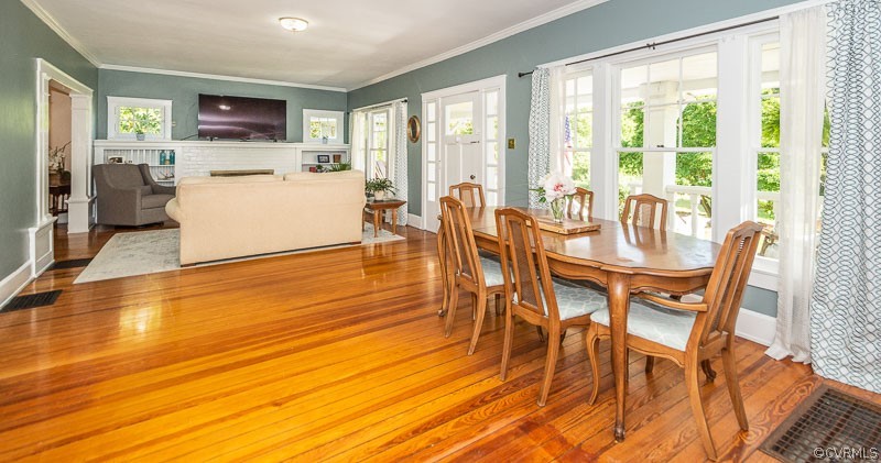 8088 Nelson Ridge Drive Hanover, VA 23069 - Photo 11 of 50 a dining room with furniture and wooden floor