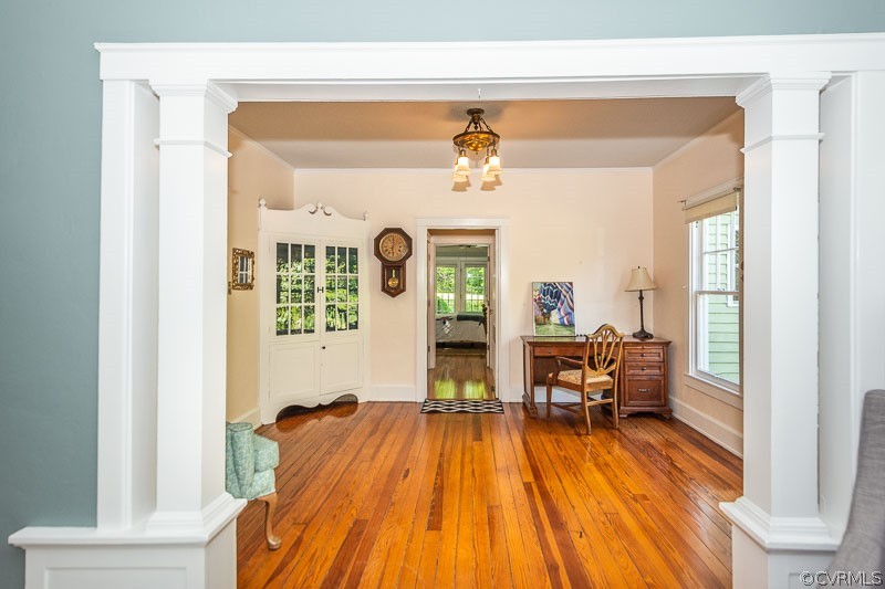 8088 Nelson Ridge Drive Hanover, VA 23069 - Photo 18 of 50 a view of a bedroom with a bed and wooden floor